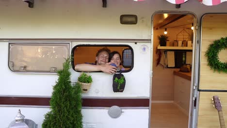 Happy,-Carefree-Young-People-Enjoying-Their-Life-In-A-Van