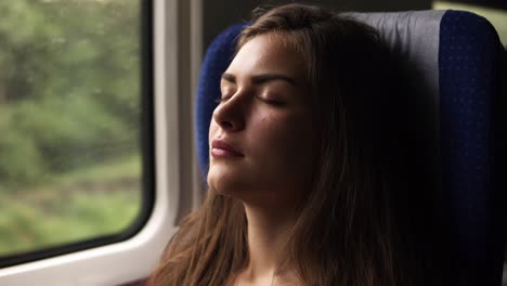 Aim-Footage-Of-A-Gorgeous-Young-Woman-Travelling-By-Train
