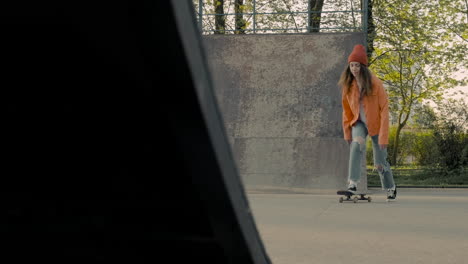 Young-Skater-Girl-Skating-At-Sunset-In-A-Skate-Park