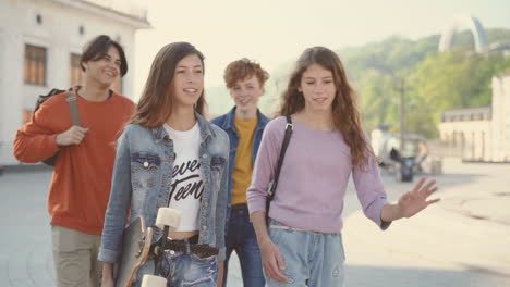 A-Group-Of-Teenagers-Walk-Down-The-Street