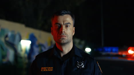 Close-Up-Of-Attractive-Brave-Police-Officer-Turning-Face-To-Camera-And-Looking-Straight-Outdoor