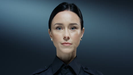 Portrait-Of-The-Young-Good-Looking-Woman-Police-Worker-Rising-Her-Eyes-Up-And-Looking-At-The-Camera