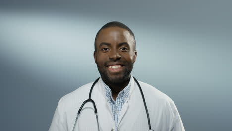 Portrait-Shot-Of-The-Young-Handsome-Man-Physician-Or-Intern-Smiling-Joyfully-To-The-Camera