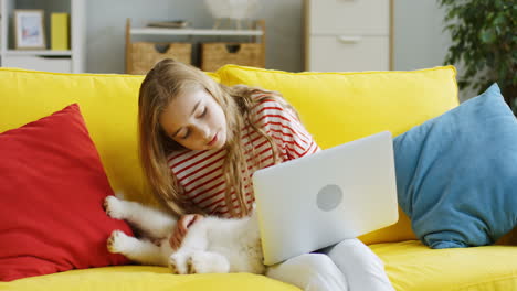 Close-Up-Of-The-Cute-Teen-Girl-Petting-Her-Little-Husky-Puppy-Dog-And-Playing-With-It,-But-It-Running-Away