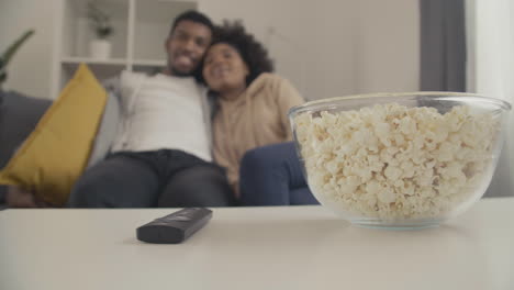 Details-Of-A-Remote-Control-A-Bowl-Of-Popcorn