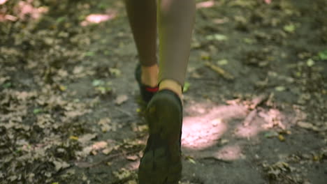 Close-Up-Of-Sportswoman-Legs-Running-In-The-Forest-1