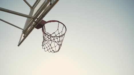 Close-Up-Of-Outdoor-Basketball-Hoop-In-A-Sunny-Day