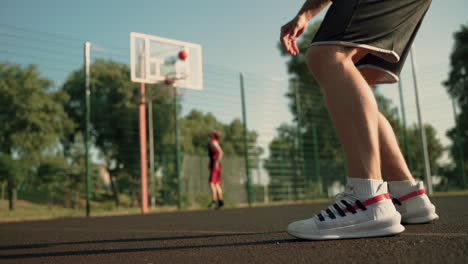 Two-Basketball-Players-Training-In-An-Outdoor-Basketball-Court