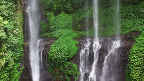 Aerial-View-Of-Waterfall-On-A-Greenish-Mountain