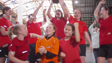 Women-Football-Players-Celebrating-After-Winning-The-Championship