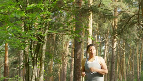 Curvy-Woman-Running-In-The-Forest