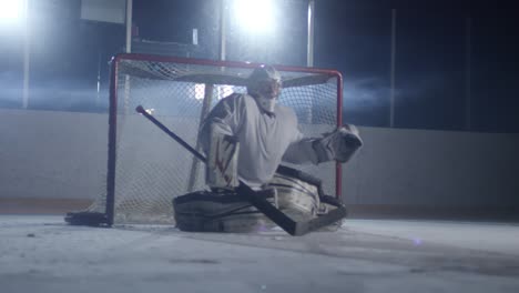 Goaltender-Protecting-Net-During-Hockey-Match
