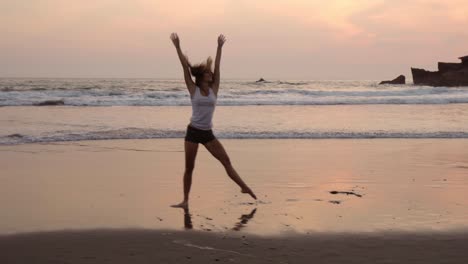 Pretty-Sportive-Girl-Doing-Cartwheels-On-The-Beach