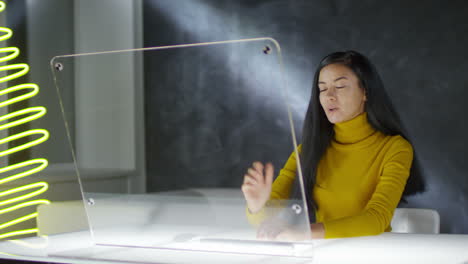 Woman-Interacting-With-A-Blank-Methacrylate-Screen