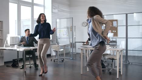 Excited-Business-Team-Dancing-In-The-Office-1