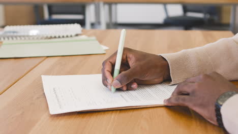 Close-Up-View-Of-The-Hand-Of-A-Young-Man-Signing-An-Employment-Contract-At-A-Job-Interview