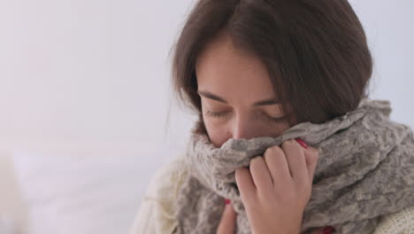 Sick-Woman-With-A-Warm-Scarf-Around-Neck-Having-Breath-Difficulties-At-Home-1