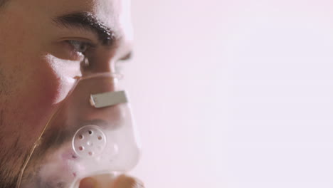 Close-Up-Of-A-Sick-Man-Breathing-Through-Oxygen-Mask-2