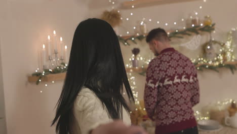 Beautiful-Woman-Taking-A-Selfie-Video-With-Her-Boyfriend-On-Christmas-At-Home