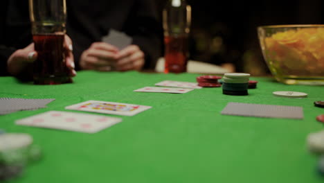 Camera-Focuses-On-Poker-Chips-And-Playing-Cards-On-The-Table-2