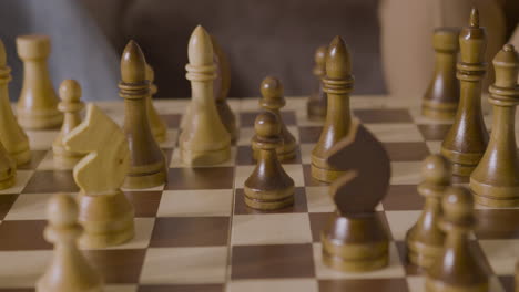 Close-Up-Of-Two-Unrecognizable-People-Playing-Chess