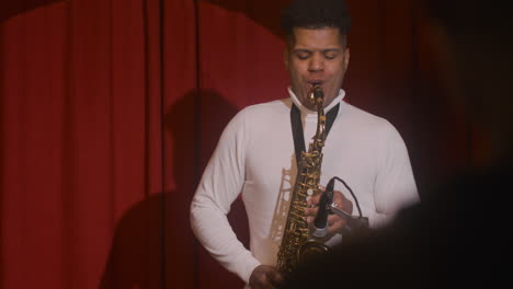 Latin-Man-Playing-Sax-During-Live-Music-Perfomance