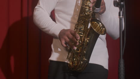 Close-Up-View-Of-Latin-Man-Playing-Sax-During-Live-Music-Perfomance