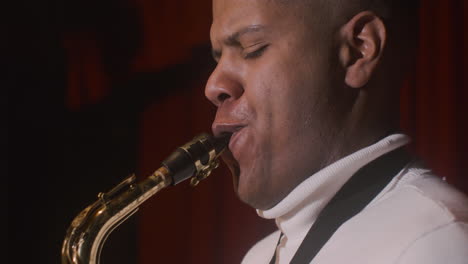 Close-Up-View-Of-Latin-Man-Playing-Sax-During-Live-Music-Perfomance-1