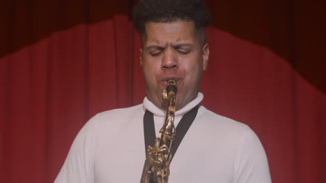 Close-Up-View-Of-Latin-Man-Playing-Sax-During-Live-Music-Perfomance-3
