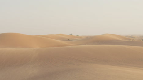 Wind-Blowing-Over-Sand-Dune-In-The-Desert-1