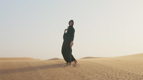 Beautiful-Barefoot-Woman-In-Hijab-Posing-In-A-Windy-Desert-1