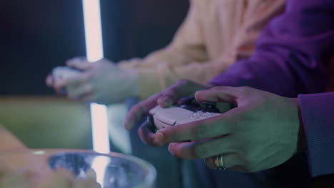 Close-Up-View-Of-A-Young-Boy's-Hands-Holding-A-Gamepad