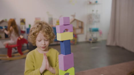 Blond-Little-Boy-Playing-With-Foam-Building-Blocks-In-A-Montessori-School-1