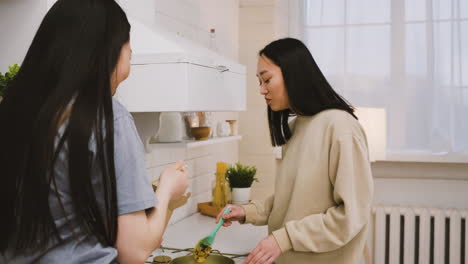 Two-Japanese-Friends-In-The-Kitchen-2