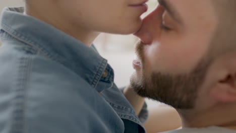 Close-Up-View-Of-Young-Couple-Kissing-And-Hugging