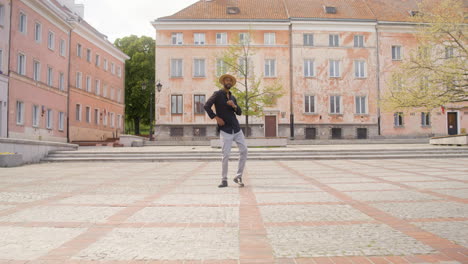 Afro-Caribbean-Man-Dancing-Alone-In-A-Public-Square