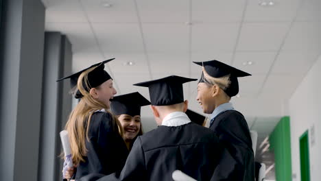 Group-Of-Happy--Preschool-Students-In-Mortarboard-And-Gown-9