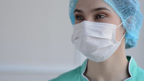 Portrait-Of-Beautiful-Nurse-With-Medical-Mask-Copy-Space