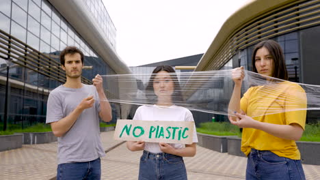 Three--Friends-Protesting-Against-Plastic-1