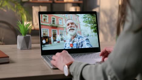 Laptop-Screen-With-Video-Conference-Between-Girl-And-Her-Grandfather