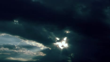 Sunbeams-Shoot-Through-Dark-Time-Lapse-Storm-Clouds-(Loop)
