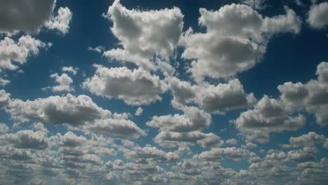 Time-Lapse-Clouds-Travel-Across-A-Blue-Sky