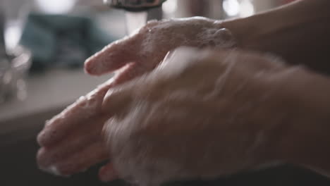 Close-up-of-woman-thoroughly-washing-her-hands
