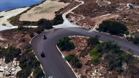 Aerial-Beautiful-Island-Paradise-Motorbike-And-Quad-Bikes-On-Winding-Coastal-Road