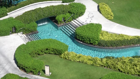 Beautiful-swimming-pool-in-garden-decoration-in-hotel-resort-4