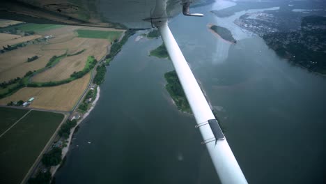 Beautiful-aerial-footage-from-a-small-plane-over-the-Columbia-River-near-Portland,-Oregon