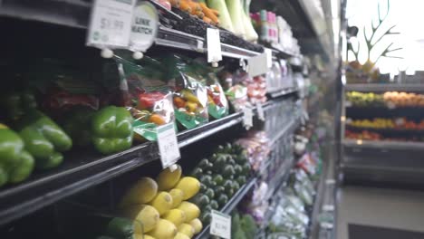 At-the-Supermarket:-Slow-dolly-in-on-fruit-vegetables-at-the-attractive-grocery-store-market