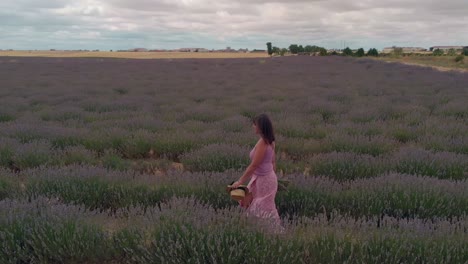 Woman-walking-through-a-lavender-field