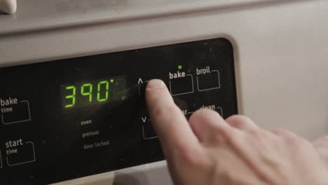 Preheating-An-Oven-To-Four-Hundred-Twenty-Five-Degrees-Fahrenheit-For-Baking---Closeup-Shot