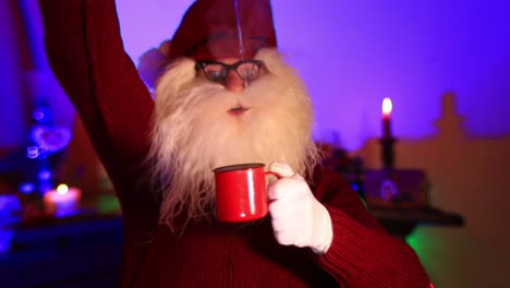 Santa-Claus-Pouring-Hot-Water-Into-An-Old-Metal-Cup